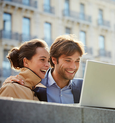 a-smiling-man-and-woman-looking-at-a-laptop-screen-2026-03-25-00-55-09-utc.jpg