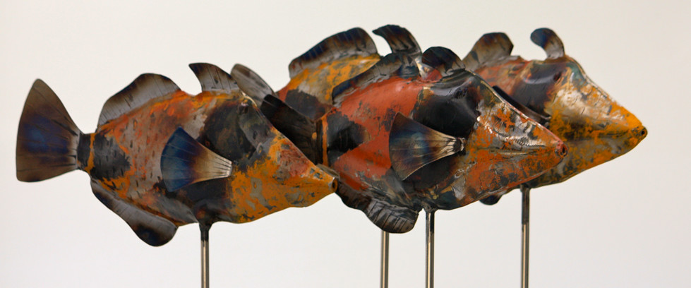 small school of HUMUHUMUNUKUNUKUAPUAʻA made from inflated steel