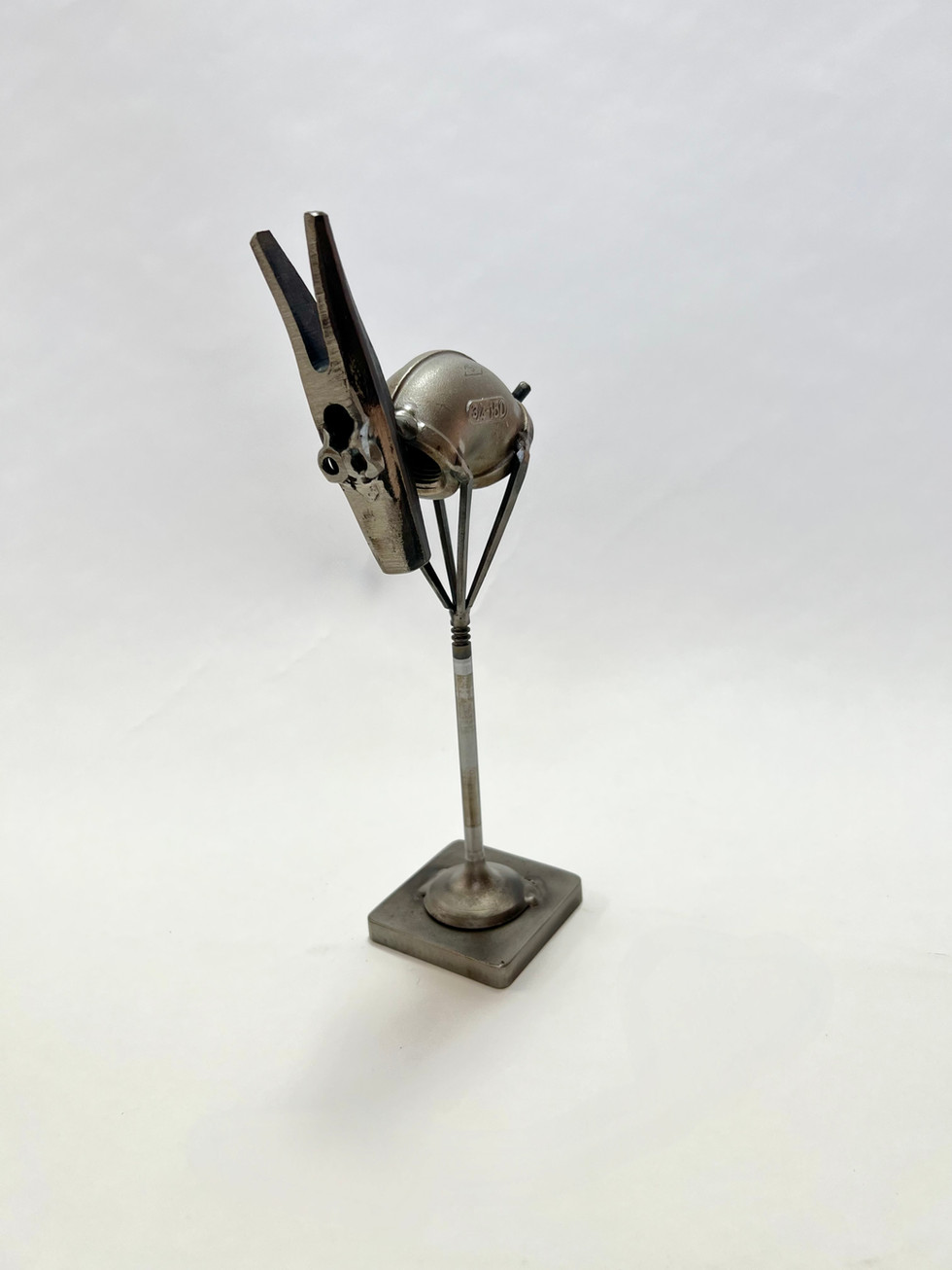 small mountain goat made from stainless steel pipe fitting and hammer head