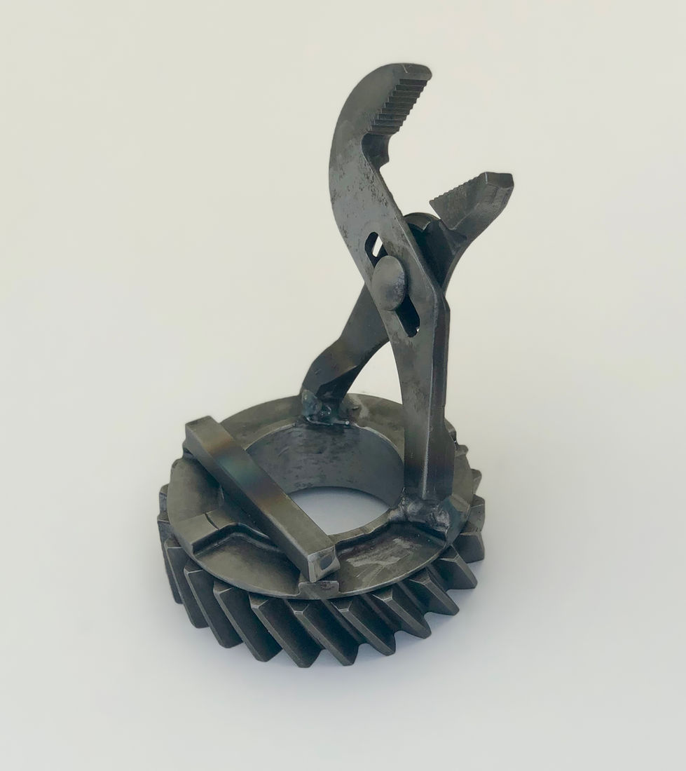Metal phone or card holder made from a gear and channel lock pliers