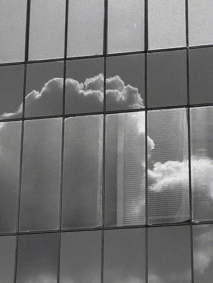 Gen-4 animate this image into a looping GIF, static camera, cloud movement on glass, timel