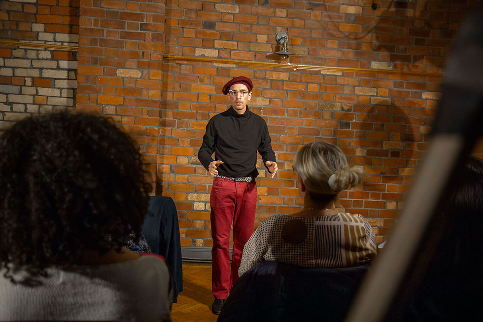 Performer captured in a dramatic moment during Bristol theatre night