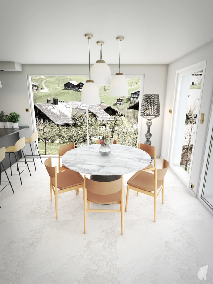 Décoration d'une pièce de vie luxueuse à Chavanod par le studio de décoration et architecture Coralie Vasseur : salle à manger lumineuse et chaises en cuir, table en marbre