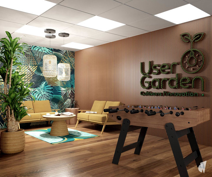 Aménagement d'un plateau de bureaux à Annecy par l'architecte d'intérieur Coralie Vasseur : accueil de l'espace coworking avec babyfoot