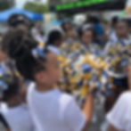 female cheerleaders with pom poms