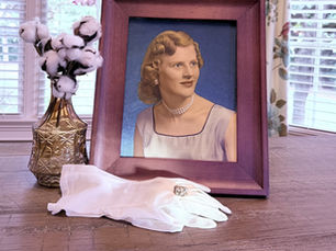 Joy's senior picture, her gloves and cotton patch ring.