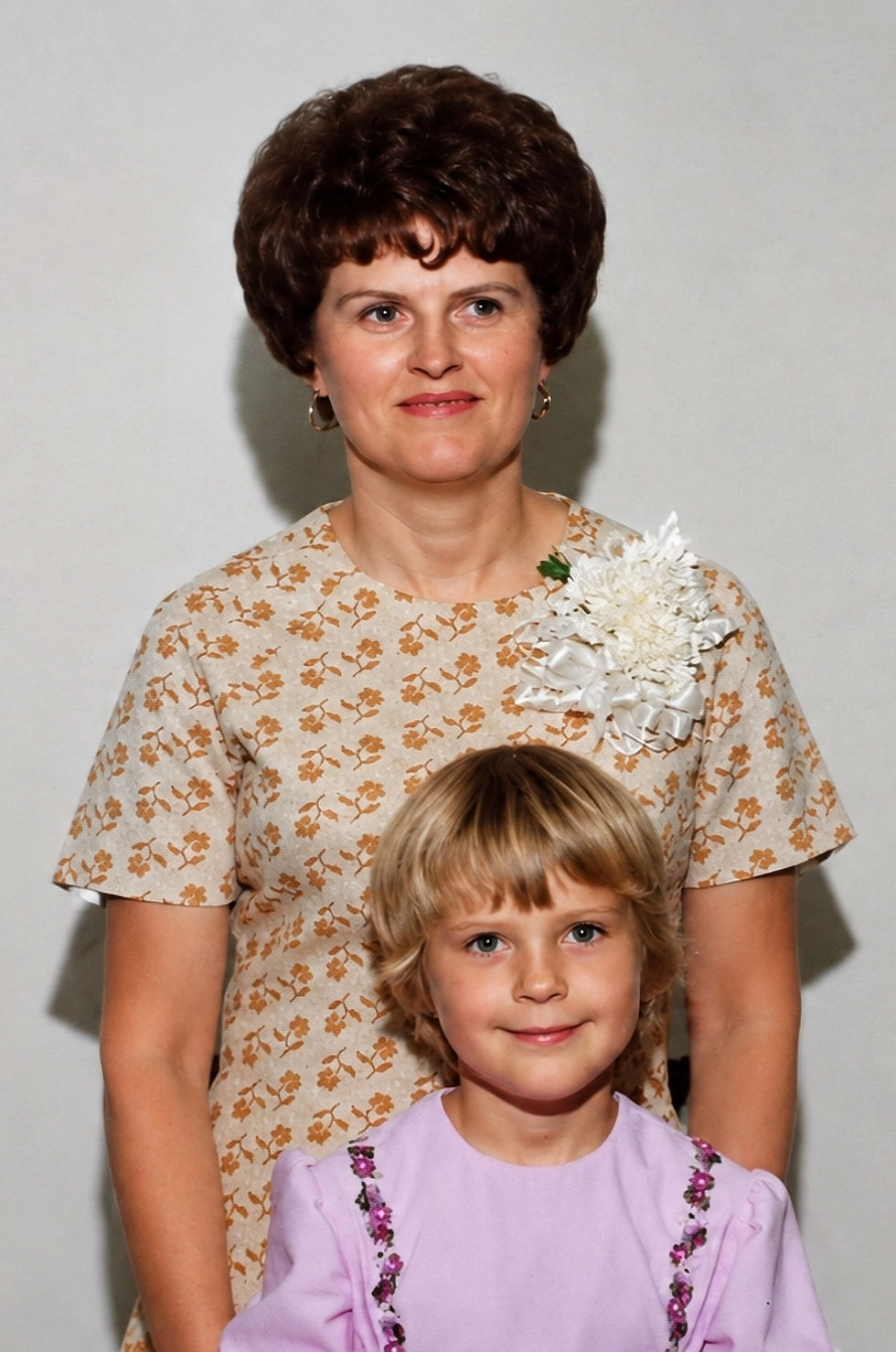Joy and Robin wearing dresses sewn by Joy.