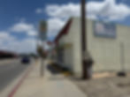 Professional graffiti removal from a commercial building exterior, restoring the surface to its original clean finish using specialized pressure washing and paint matching. For urgent restoration services, call Solano Property Maintenance at 626-344-0337