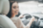 women in drivers seat.