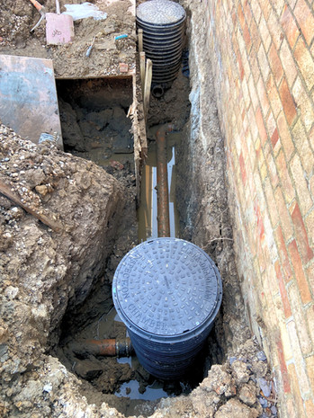 groundwork: laying foundations and diverting four manholes