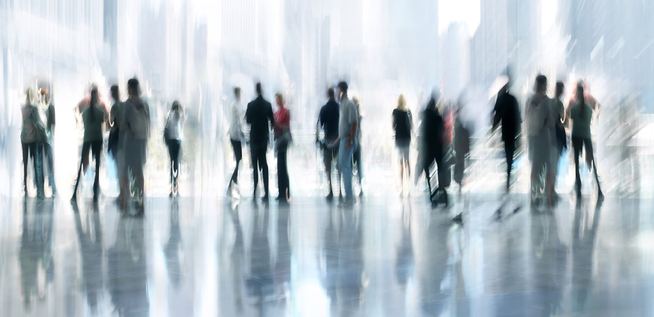 Blurred people mingling