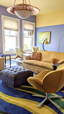 The den and seating areas of Harmony at CenterPoint Executive Lofts