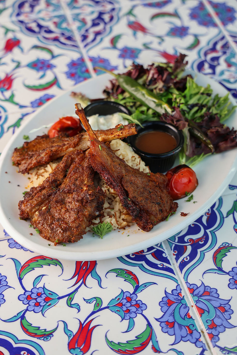 High angle view of a Turkish kebab dish served on a rustic table