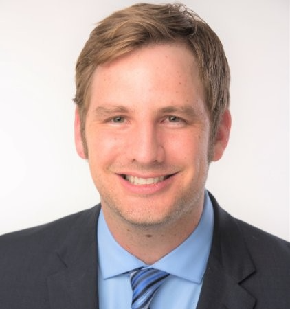 Smiling man in suit and tie