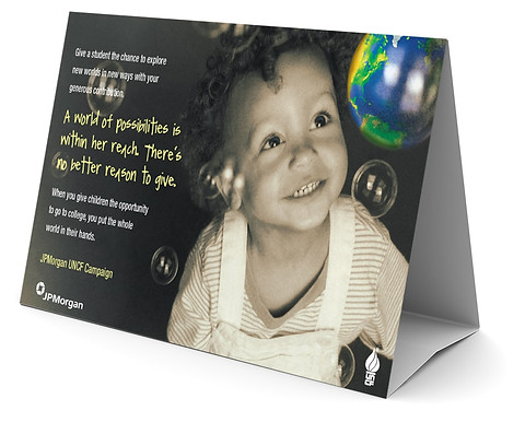 girl gazing at globe soap bubble