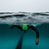 A swimmer in the open water pretending it is a pool