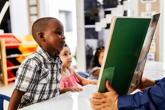 Little boy looking a Book. Child learning concept.jpg