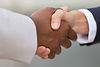 closeup-diverse-business-colleagues-handshake.jpg