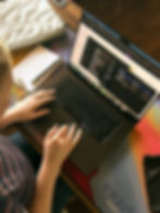Close up of Paige working on the computer