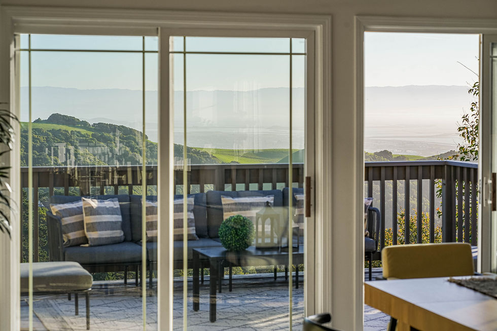 Wide angle view of a luxury home patio with Bay Area view