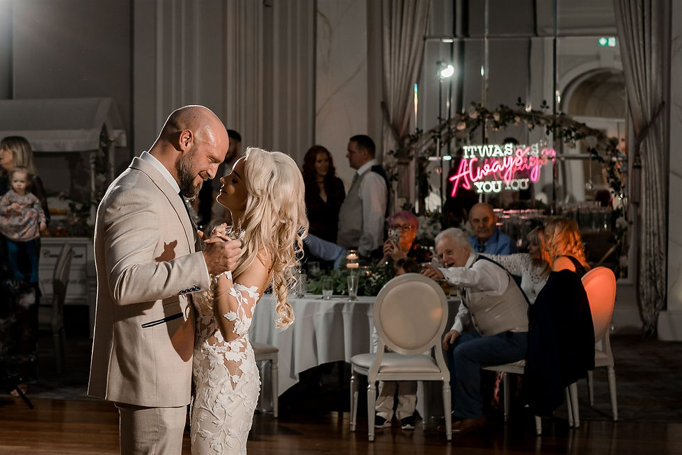 a bride and groom have their first dance at their wedding at Tullyglass house hotel