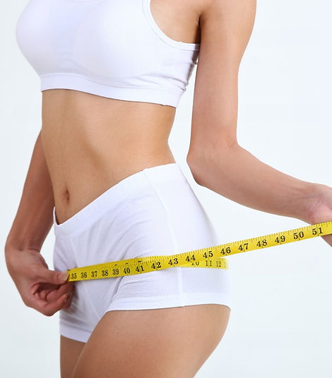 young-woman-with-beautiful-body-slime-measure-tape (1).jpg