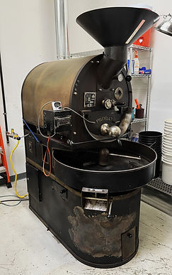 "A steaming cup of freshly brewed coffee on a wooden table