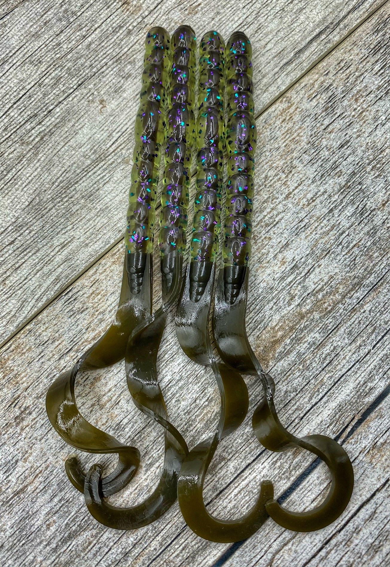 7.5" CORE SHOT CURL TAIL WORMS- GREEN PUMPKIN FLASH