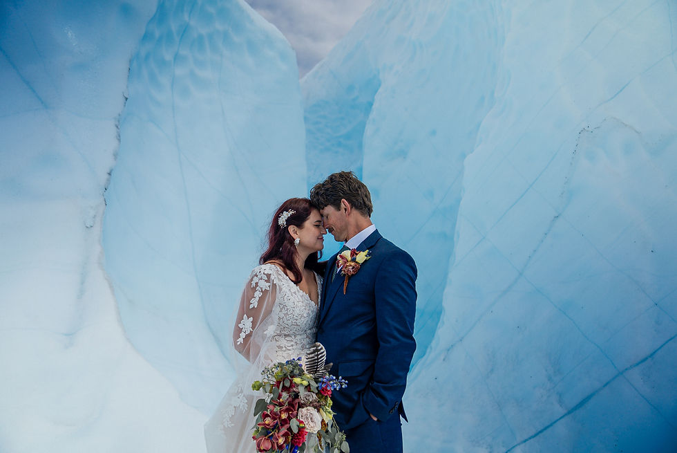 Rare water fall on glacial ice is the perfect and private location for an Alaska elopement ceremony