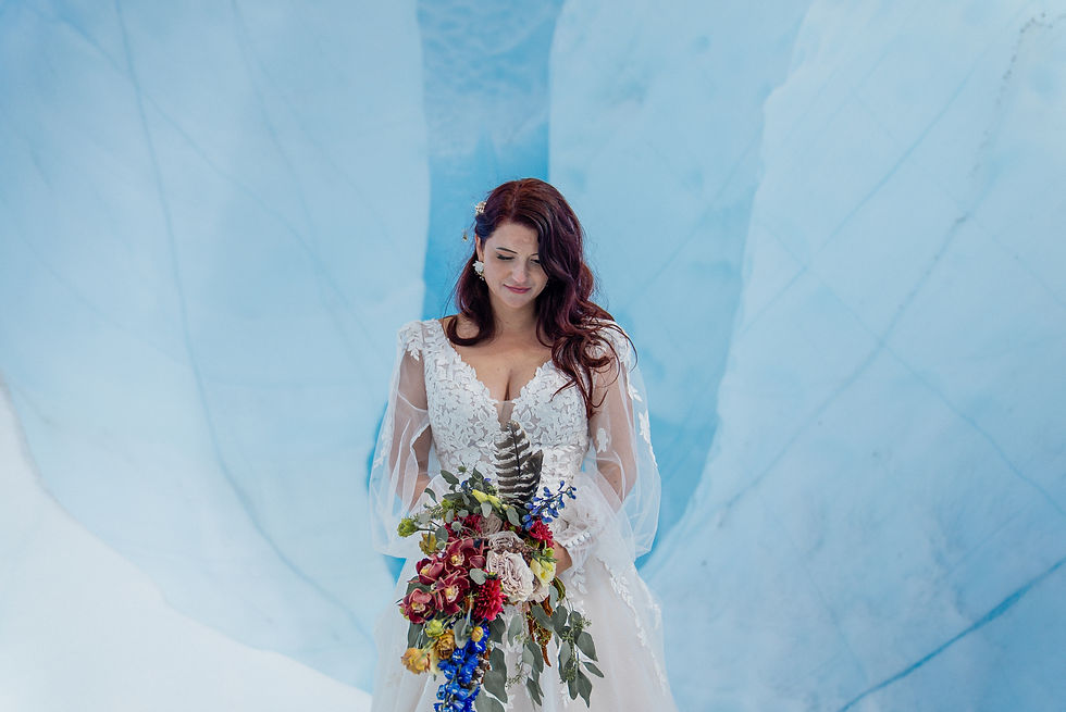Alaska glacier elopement with blue and burnt orange color scheme