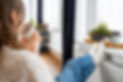 close-up-woman-sitting-near-heater.jpg