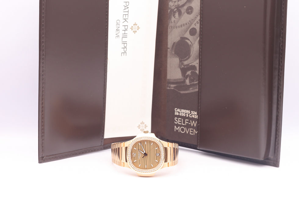 Thumbnail: Patek Philippe Ladies Nautilus 7118/1200R-010 Rose Gold Full Set 2018 Monaco papers