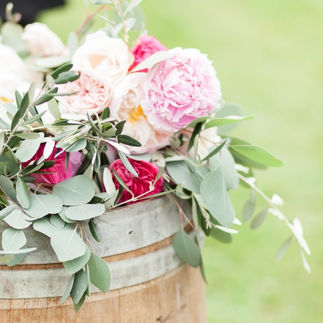 Rustic oak barrel with flower decoration