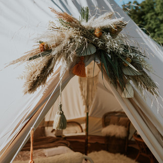 Festival wedding with bell tents and giant tipis