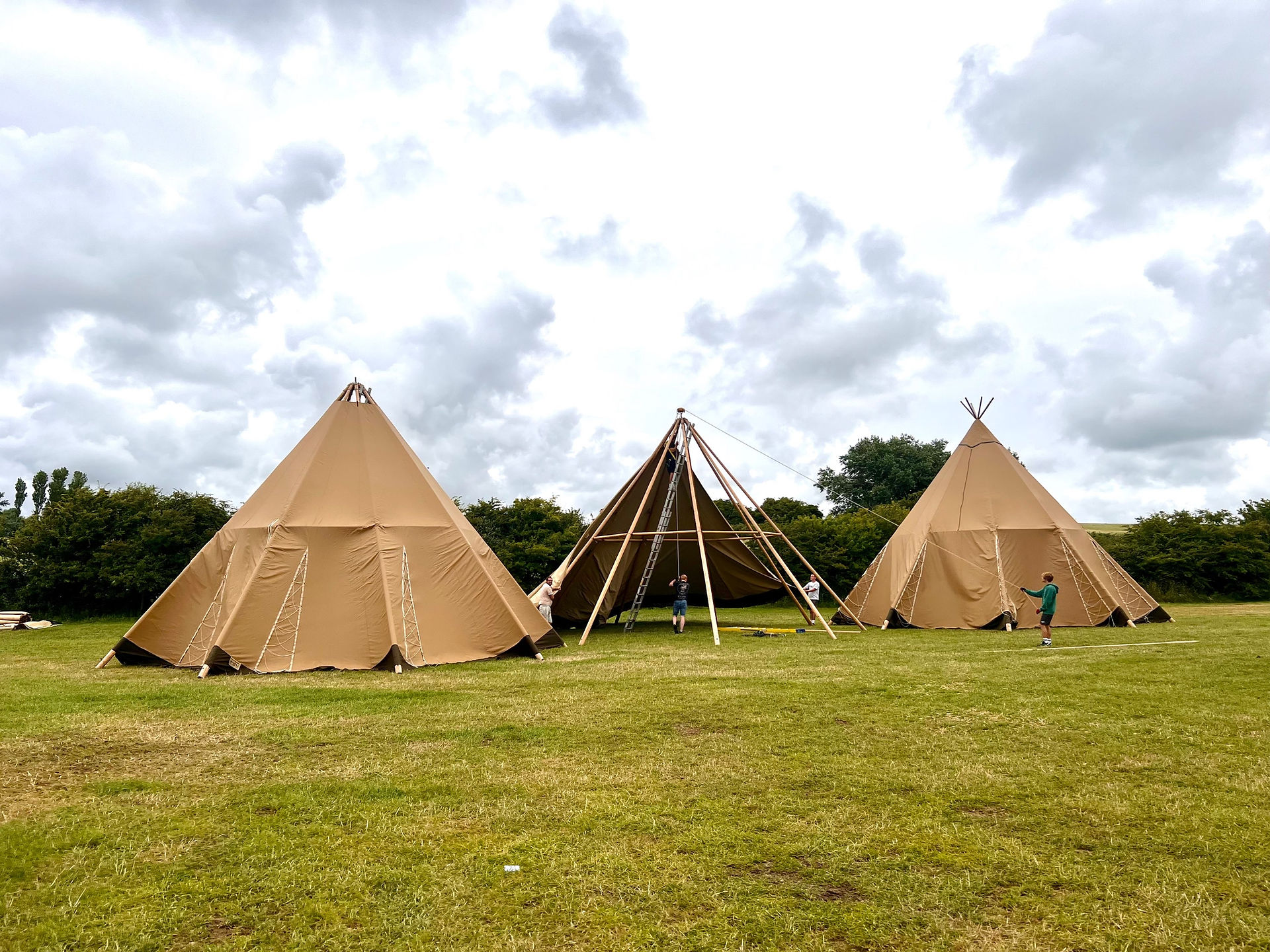 Tipis being set up 