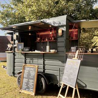 Horse box bar at tipi festival wedding