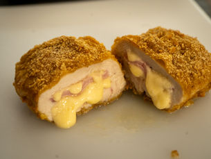 Crispy Chicken Cordon Bleu with melted cheese, smoky ham, and golden breadcrumbs. Learn classic French techniques with this easy gourmet recipe.