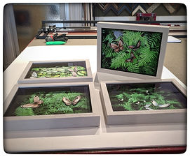 Shadowbox framed collages of ferns with butterflies