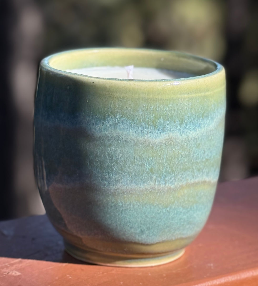 Thumbnail: Handmade ceramic candle in a blue and jade glazed pot