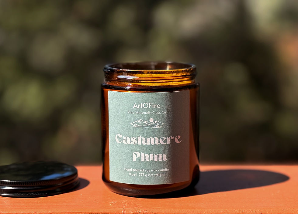 Thumbnail: Cashmere Plum Hand Poured Soy Candle in an amber glass jar