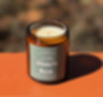 Black Sea Hand Poured Soy Candle in an amber glass jar.