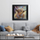 Thumbnail: Highland cow print by Ben Goymour featuring Dougal the Highland cow in rich earthy tones hanging above a sofa