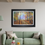 Thumbnail: Framed autumn woodland painting by Ben Goymour displayed above a mint green sofa in a modern living room