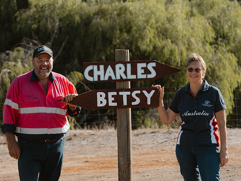 R&RBusRetreat-judith-and-simon-allington-standing-near-sign.jpg