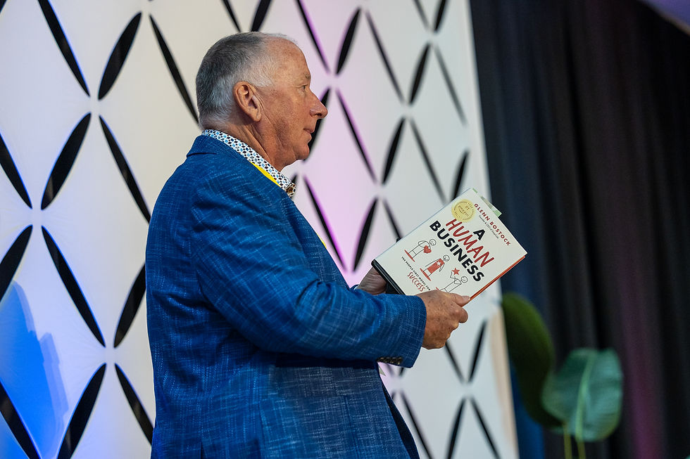 Glenn Bostock with his book A Human Business at CultureCon 2026 in Madison, WI