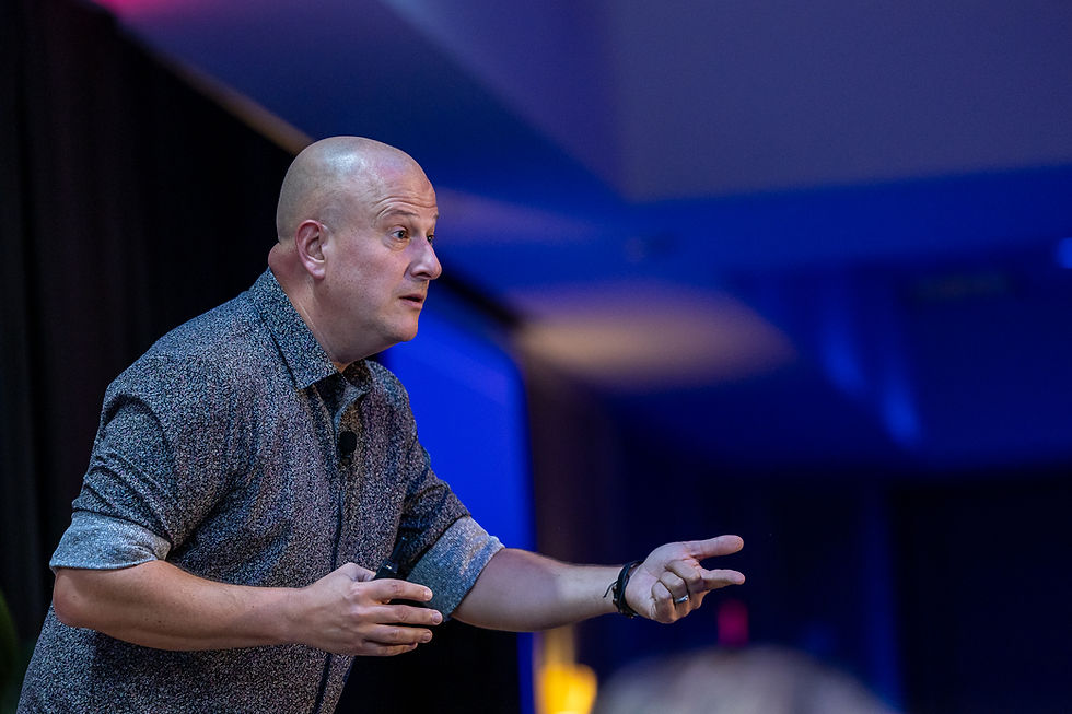 Caleb Campbell on stage at CultureCon 2026 in Madison, WI