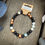 Thumbnail: Amblygonite, Obsidian & Wood Bracelet