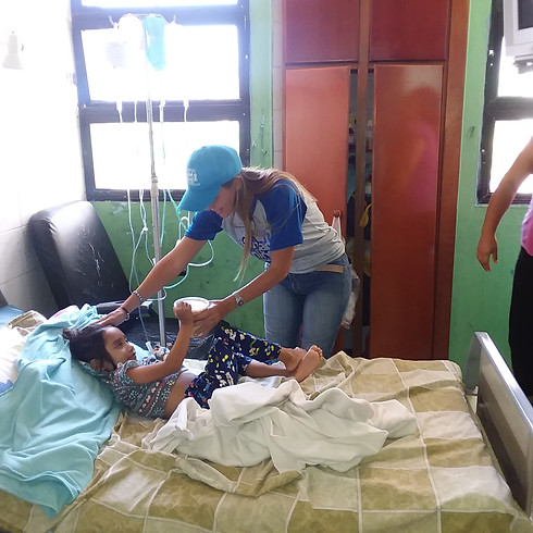entrega de comida, obra de misericordia