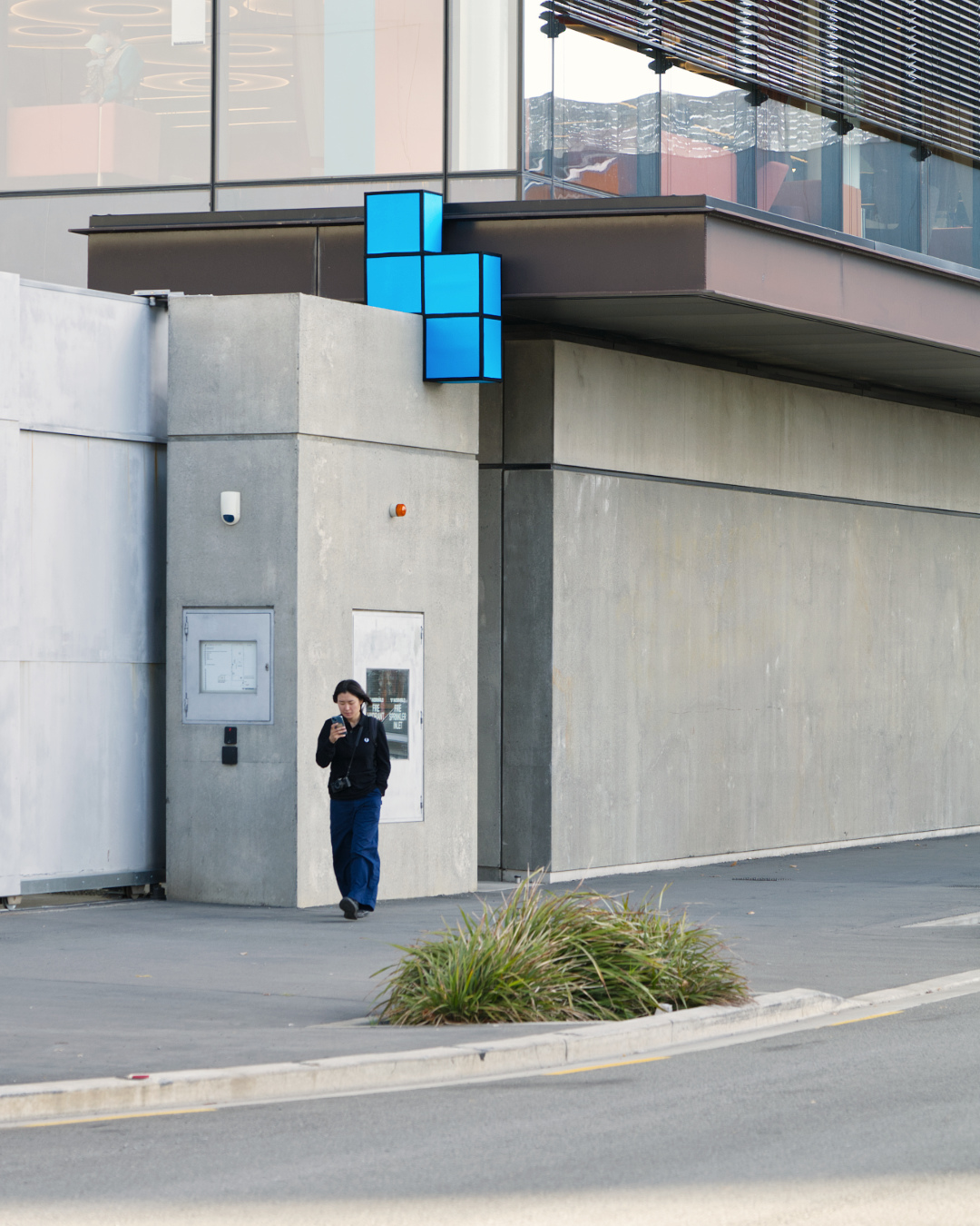 Colourful Tetris cube installation located in the urban environment by street artist Cameron Hunt.