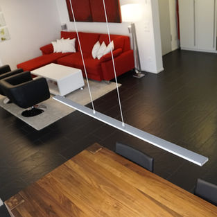 Grosszügiger Wohnbereich mit Esstisch und Küche der Residenz -Faggi.